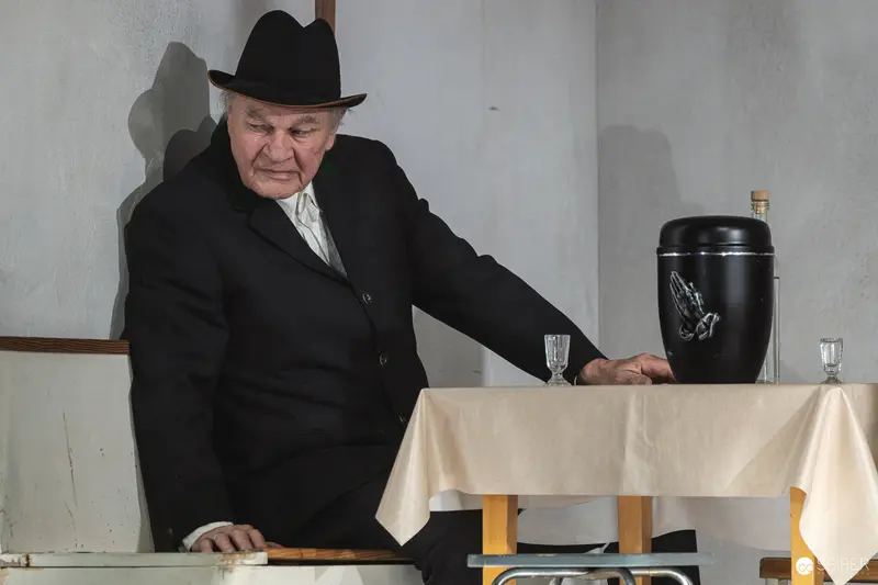 Elderly Actor in Black at Theater Rehearsal for "Azur oder die Farbe von Wasser"