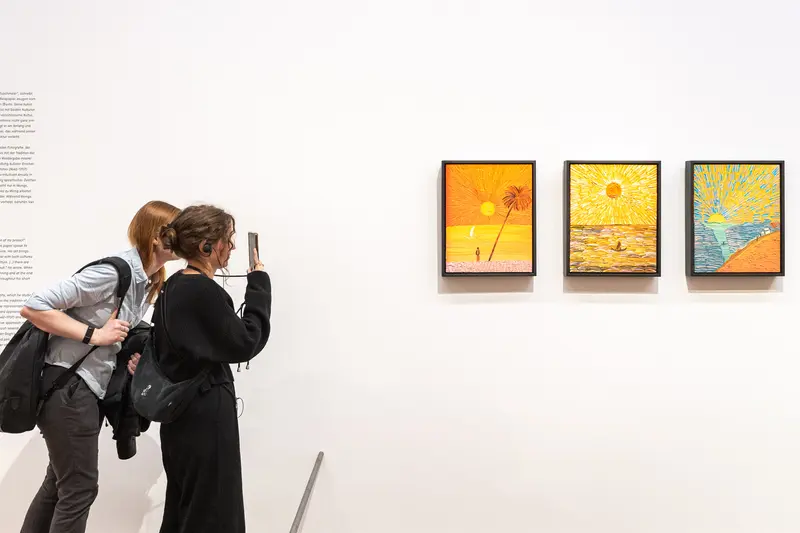 Visitors Examining Van Gogh-Inspired Artworks at Albertina Museum Exhibition