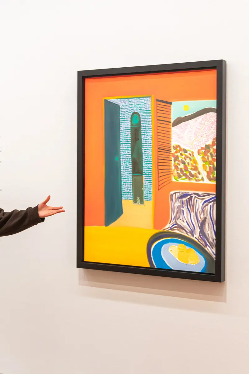 Modern Artwork Displayed with Gesturing Hand at Exhibition Wong