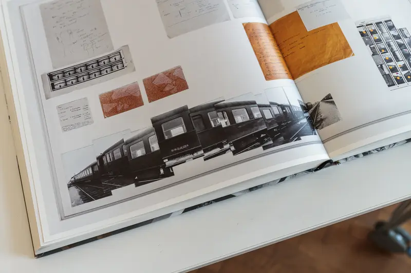 Architectural Design Book Showcasing Train Design Concept Drawings