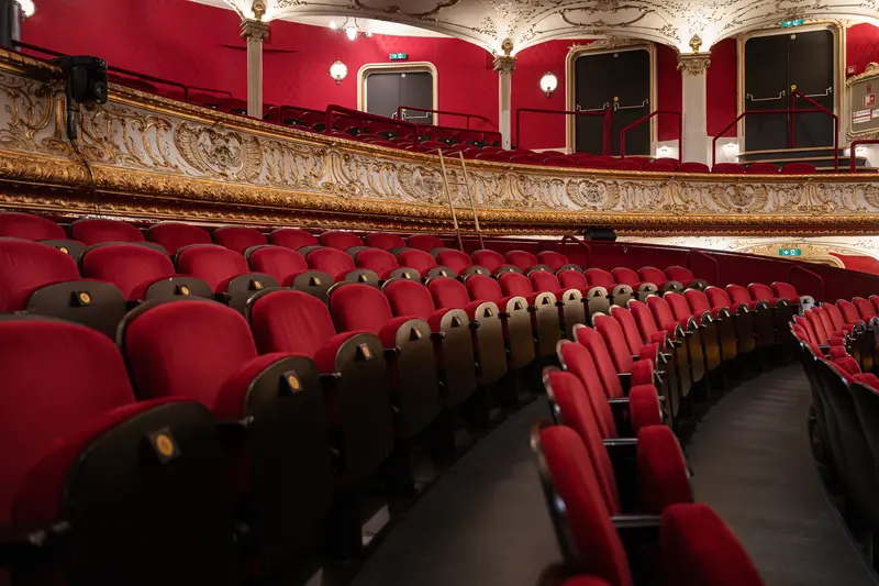 Red Velvet Seats in Historic Volkstheater Performance Hall