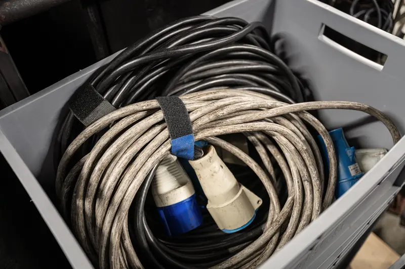 Backstage Electrical Cables Coiled in Storage Bin at Volkstheater