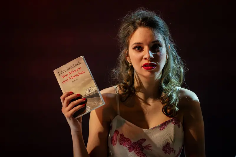 Dramatic Portrait with Book at Von Mäusen und Menschen Theater Production