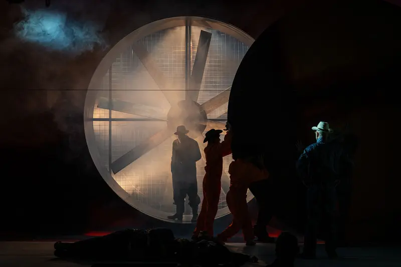 Dramatic Silhouettes in "Of Mice and Men" Theater Production Rehearsal