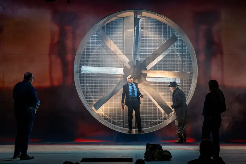 Theater Staging of "Of Mice and Men" with Dramatic Circular Ventilation Backdrop