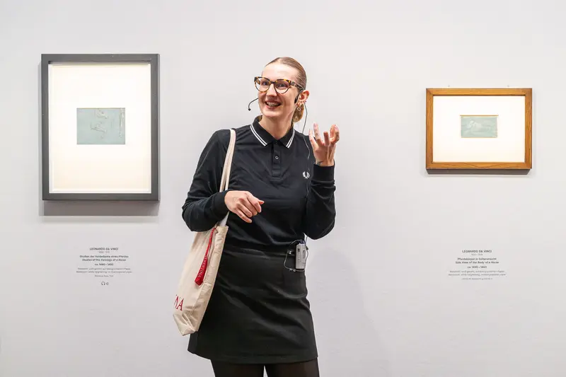 Visitor Laughing at Leonardo Dürer Exhibition in Albertina Museum, Vienna
