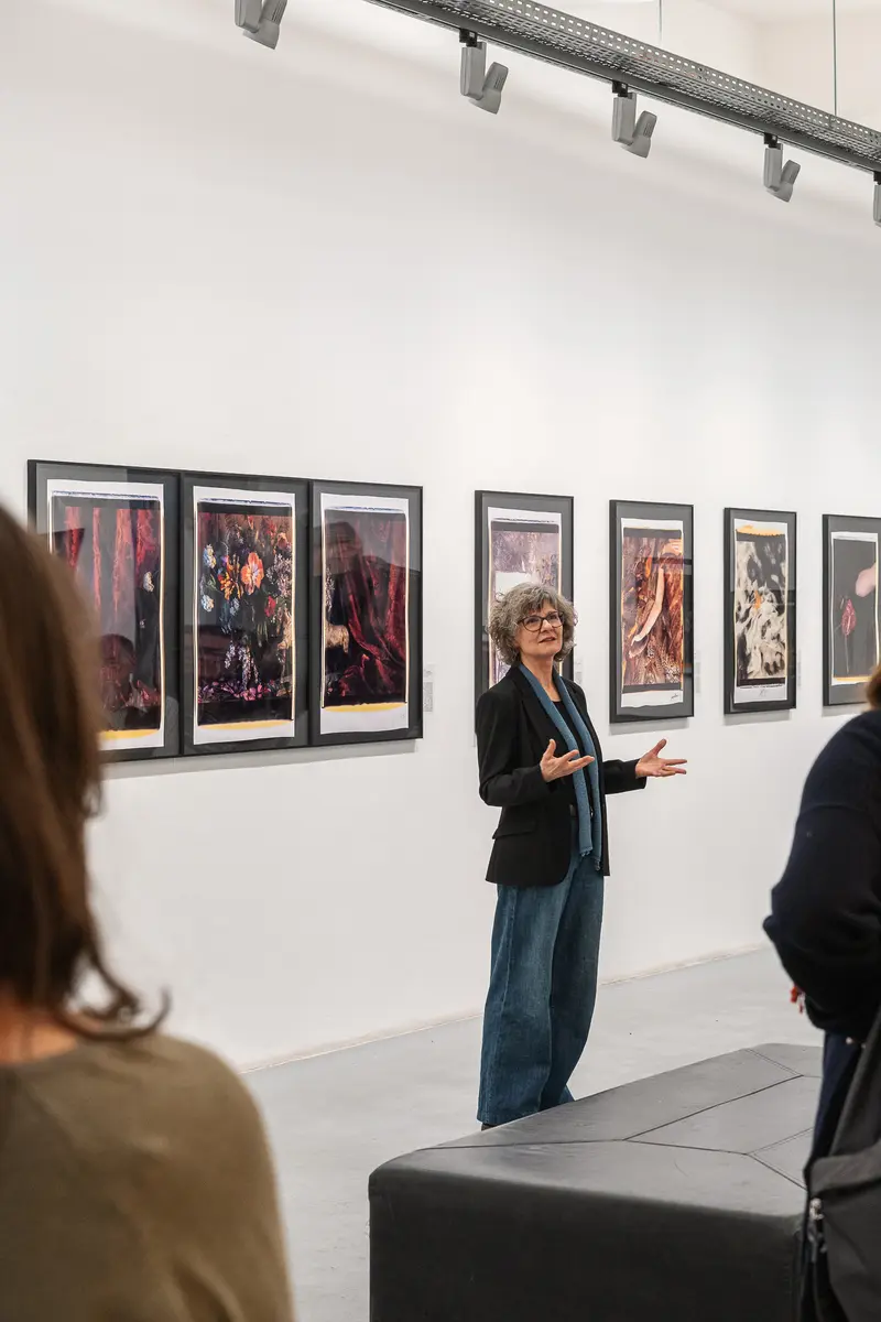 Art Gallery Curator Presenting Framed Photography Exhibition
