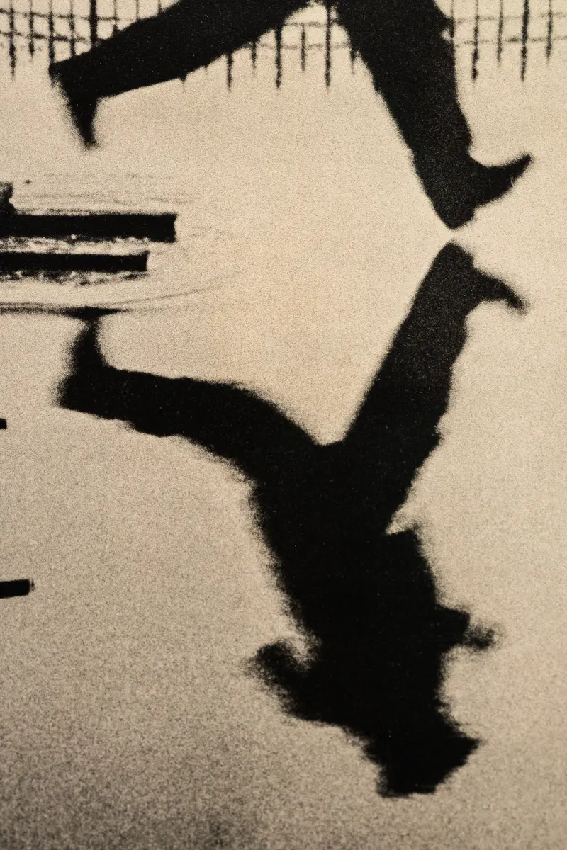 Abstract Black and White Silhouette of a Falling or Suspended Figure