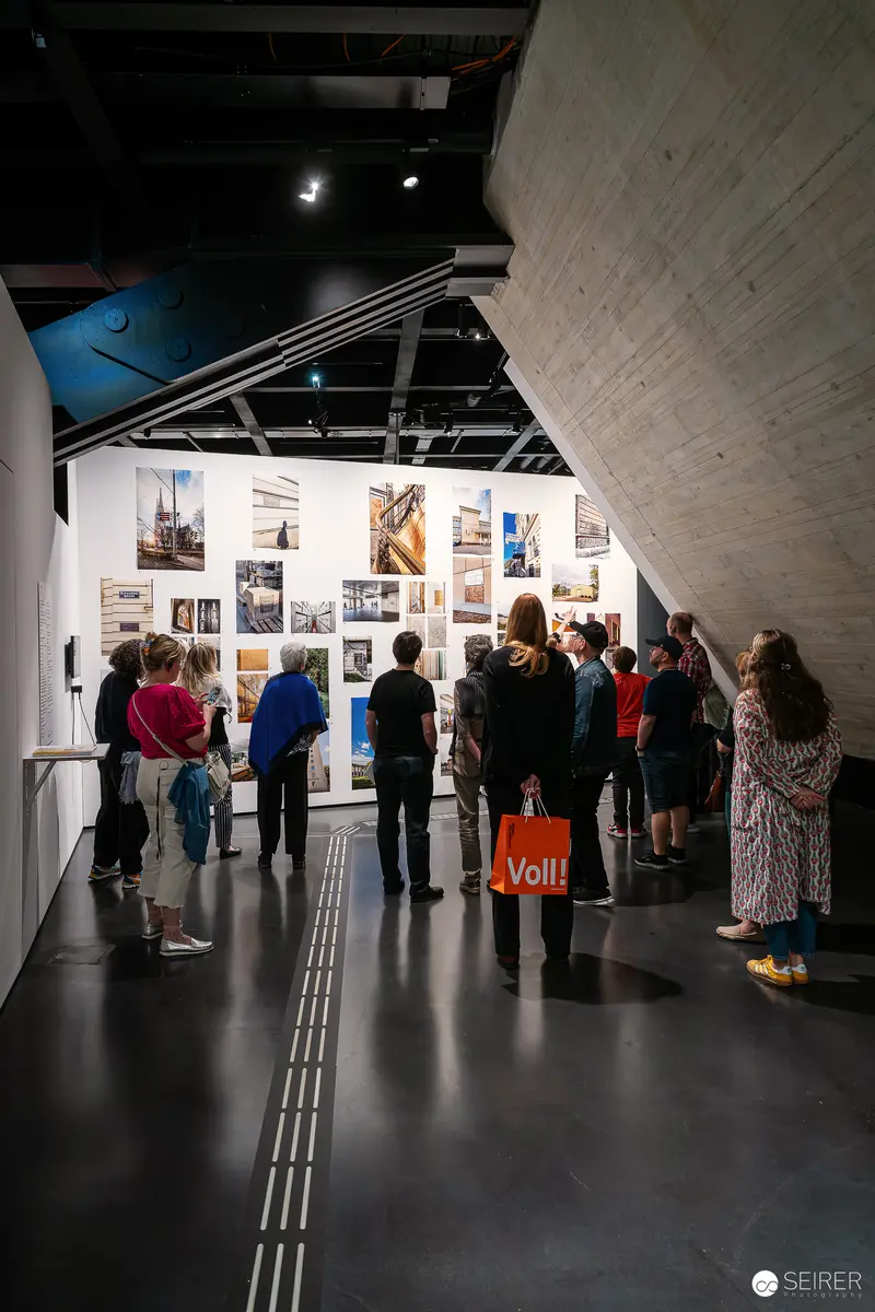 Visitors Exploring Exhibition Walls at Wien Museum's "Controlled Freedom" Display