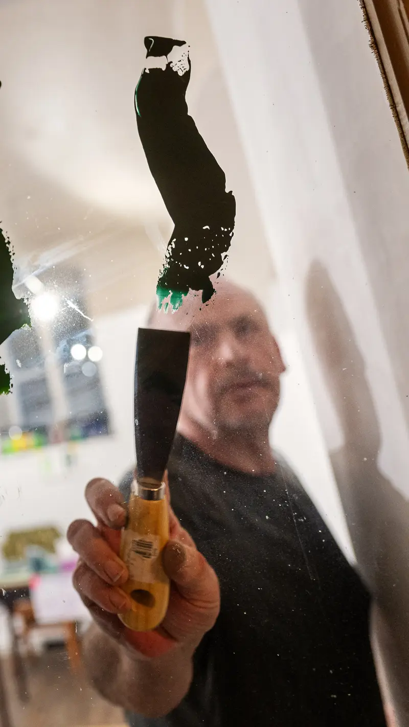 Artist Demonstrates Paint Brush Technique During Exhibition at Atlas Bar Vienna