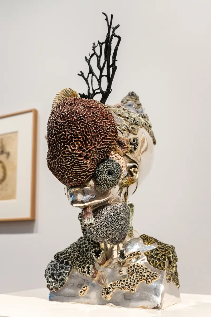 Intricate Ceramic Sculpture with Textured Organic Forms and Branching Structure
