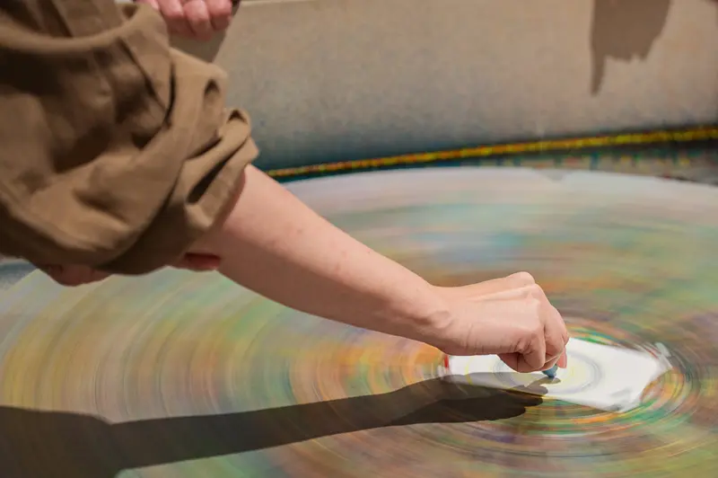 Artist Creating Mesmerizing Spinning Color Wheel Artwork