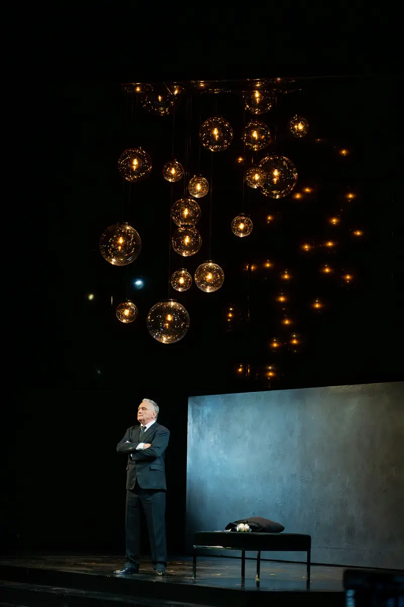 Solitary Figure on Stage during "Das Weite Land" Theater Production