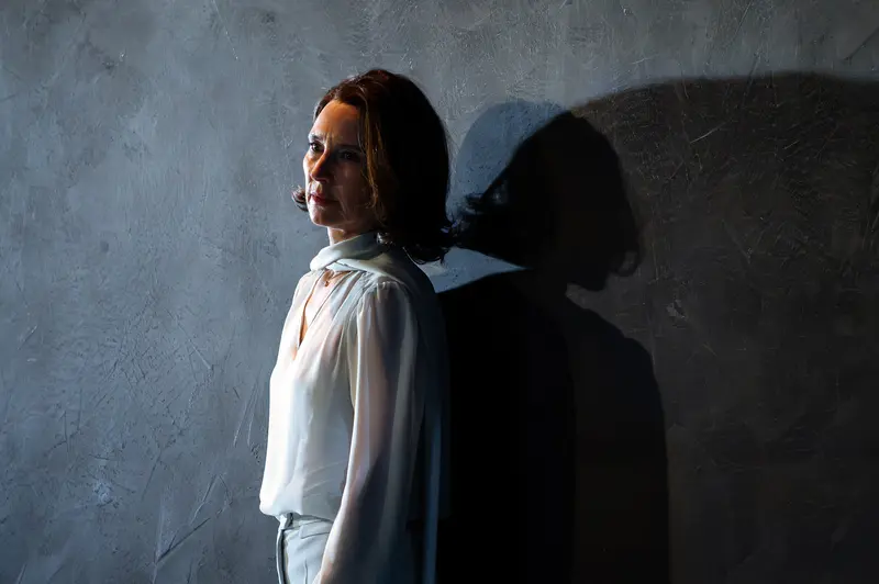 Actress Contemplating Performance During "Das Weite Land" Theater Rehearsal
