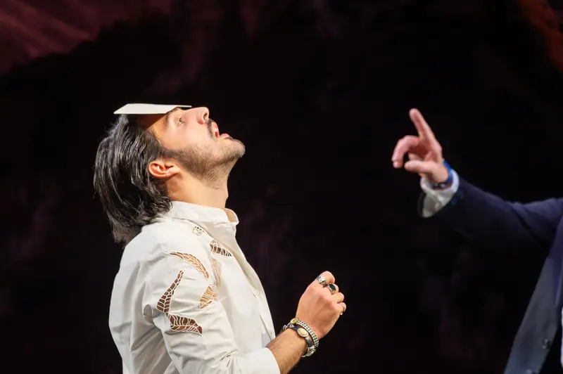 Actor in White Shirt Performing During "Das Weite Land" Theater Rehearsal