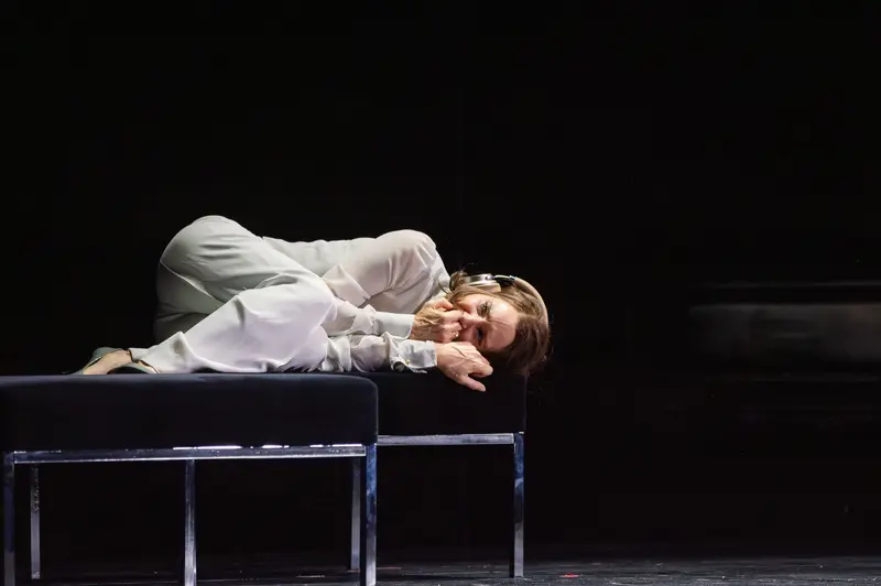 Actress in White Reclining on Stage During Rehearsal for "Das Weite Land"