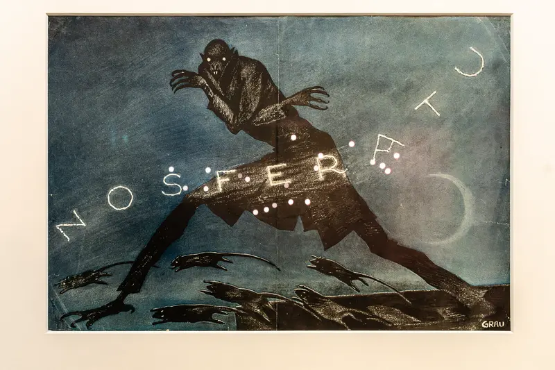 Nocturnal Shadowy Figure Emerging Through Surreal Floating Letters