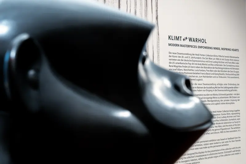 Klimt & Warhol Exhibition Poster with Blurred Black Object