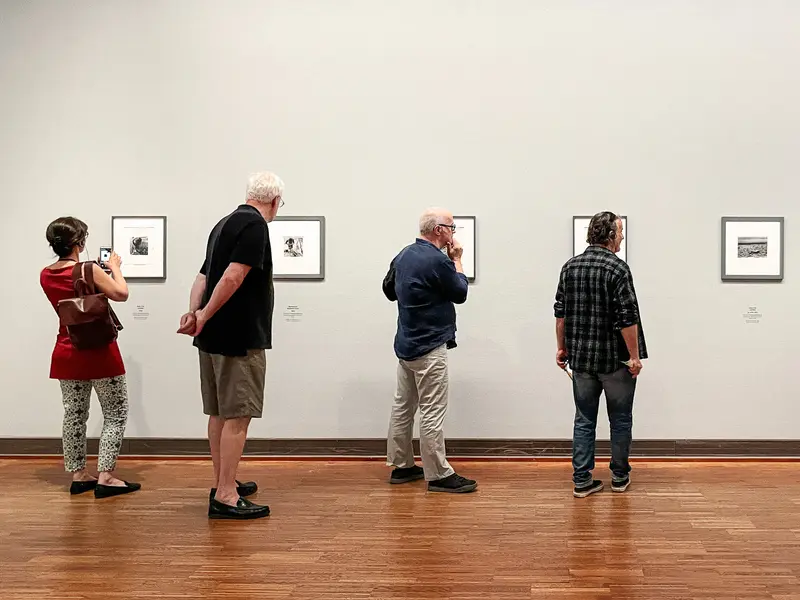 Visitors Exploring Francesca Woodman Photographic Exhibition at Albertina Museum