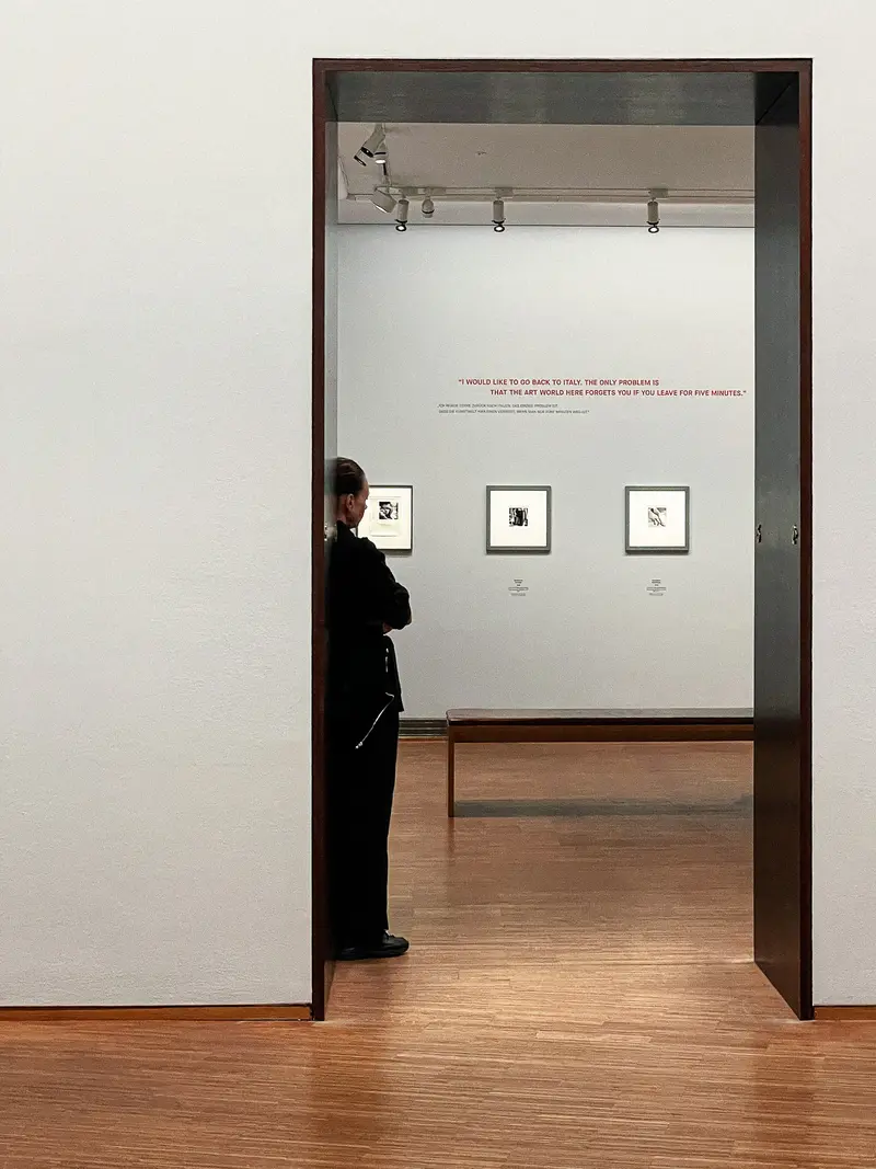 Visitor Contemplating Francesca Woodman Photographs at Albertina Museum Exhibition
