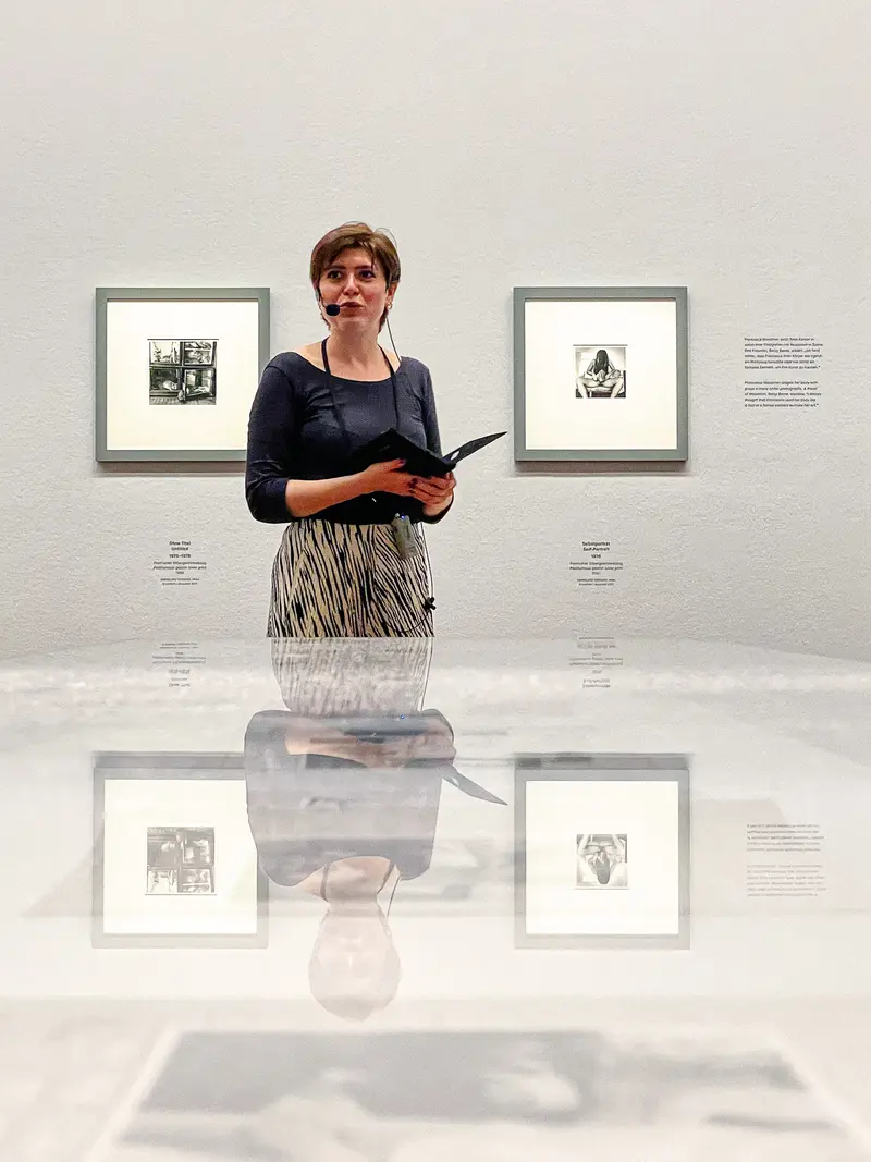 Curator Standing in Francesca Woodman Exhibition at Albertina Museum, Vienna