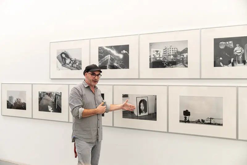 Curator Presenting Araki Photography Exhibition at Ostlicht Gallery