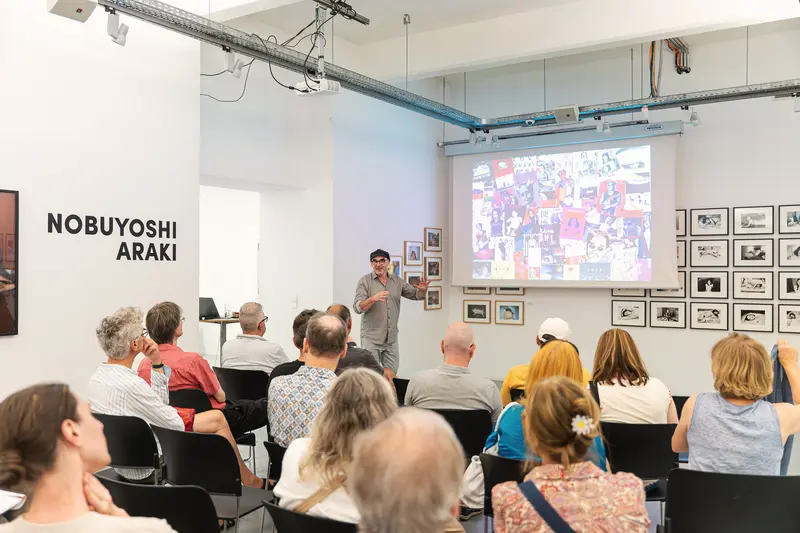 Nobuyoshi Araki Exhibition Talk at Ostlicht Gallery, Audience Attentive