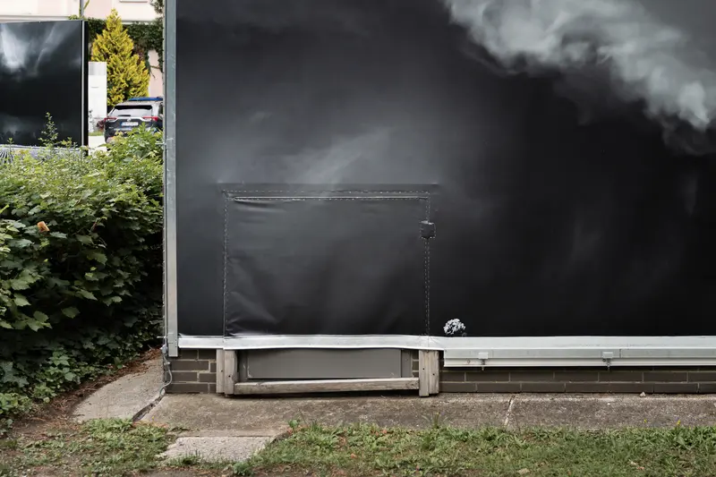 Shadowy Urban Landscape with Smoke and Bench at Outdoor Setting