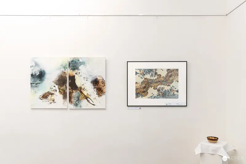 Abstract Landscape Art Display at Exhibition Showcasing Textural Mixed Media Works