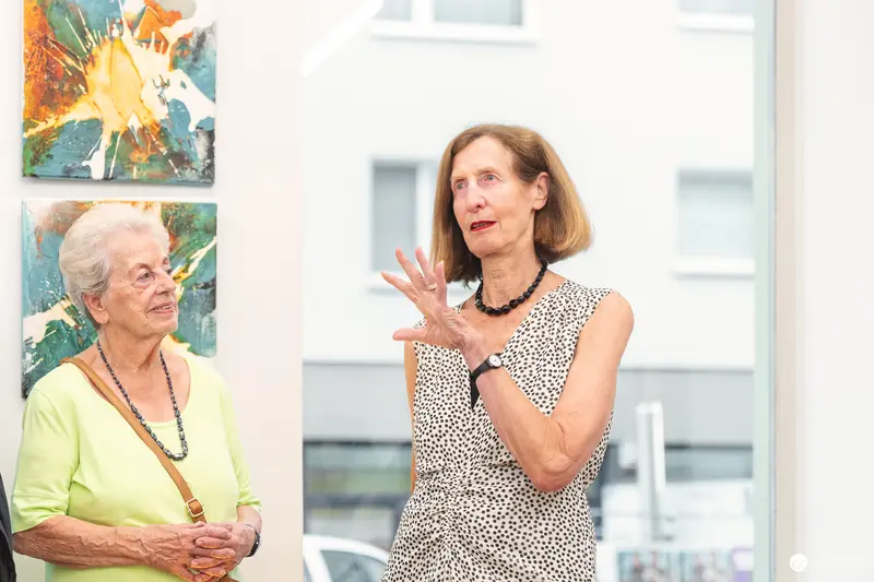 Two Women Discussing Art at Vernissage "Ladypower" Exhibition
