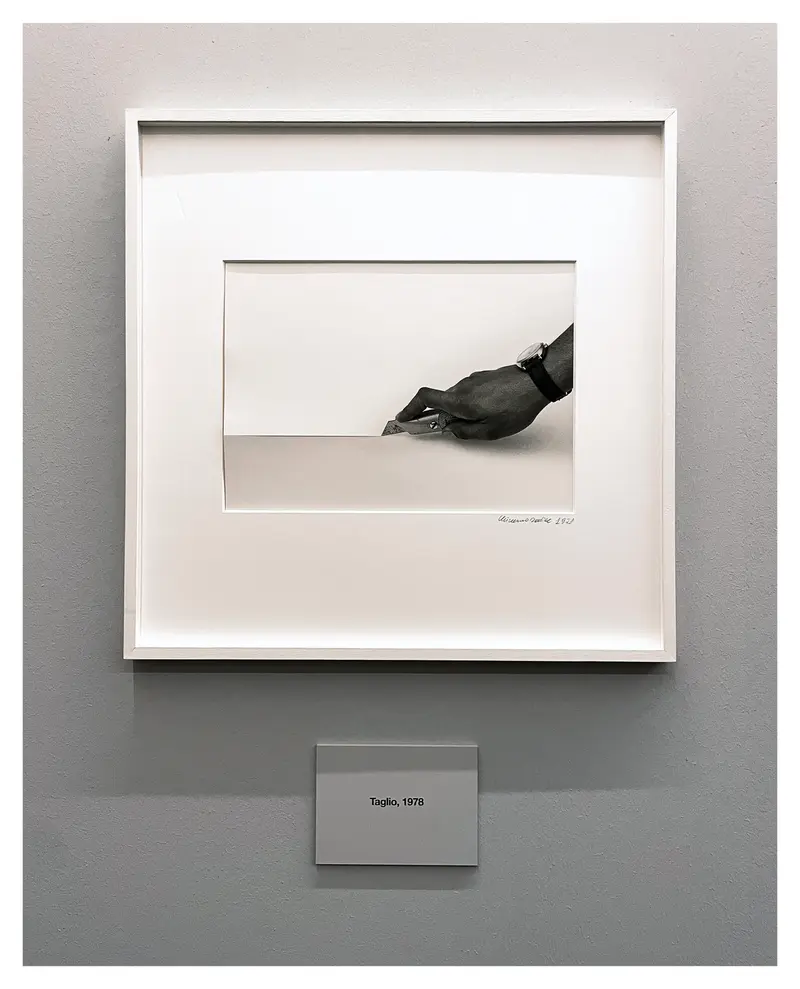 Minimalist Black and White Artwork: Hand with Writing Instrument