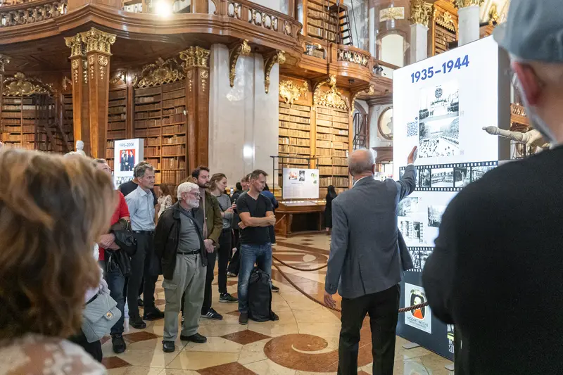 Dr. Hans Petschar Leads Tour of "A Century in Pictures" at Austrian National Library
