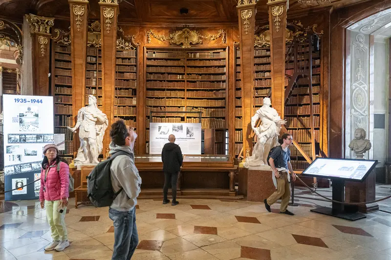 Dr. Hans Petschar Leads Exhibition Tour at Austrian National Library