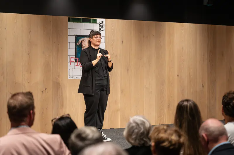 Speaker Presenting at "Fleisch" Exhibition Opening at Wien Museum