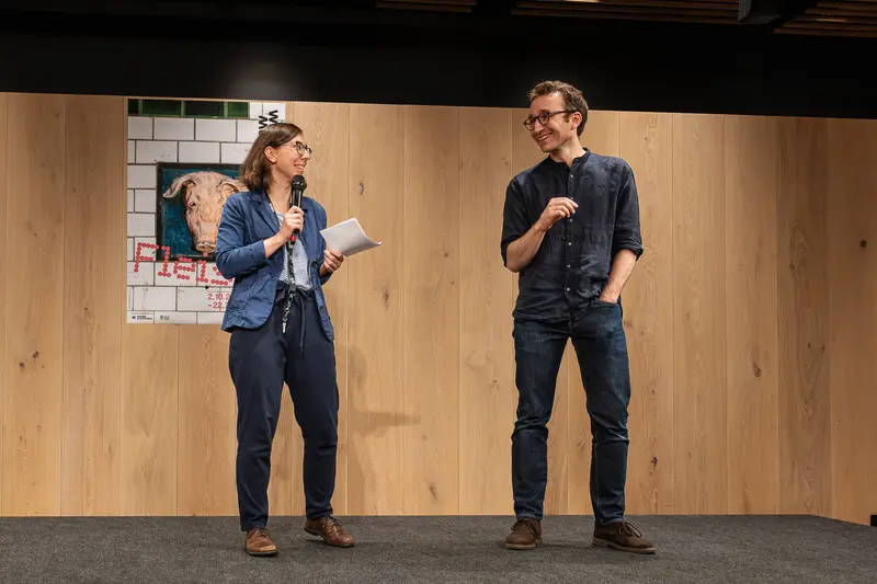 Presenters Discussing Exhibition "Fleisch" at Wien Museum Event