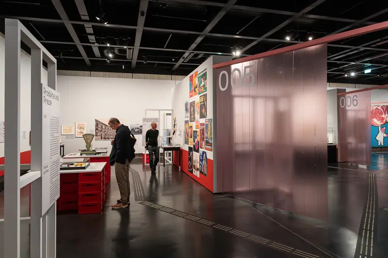 Interior View of "Fleisch" Exhibition at Wien Museum with Visitors