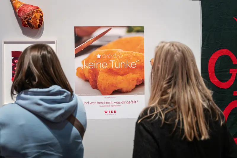 Visitors Examining "Keine Tunke" Food Exhibit at Wien Museum