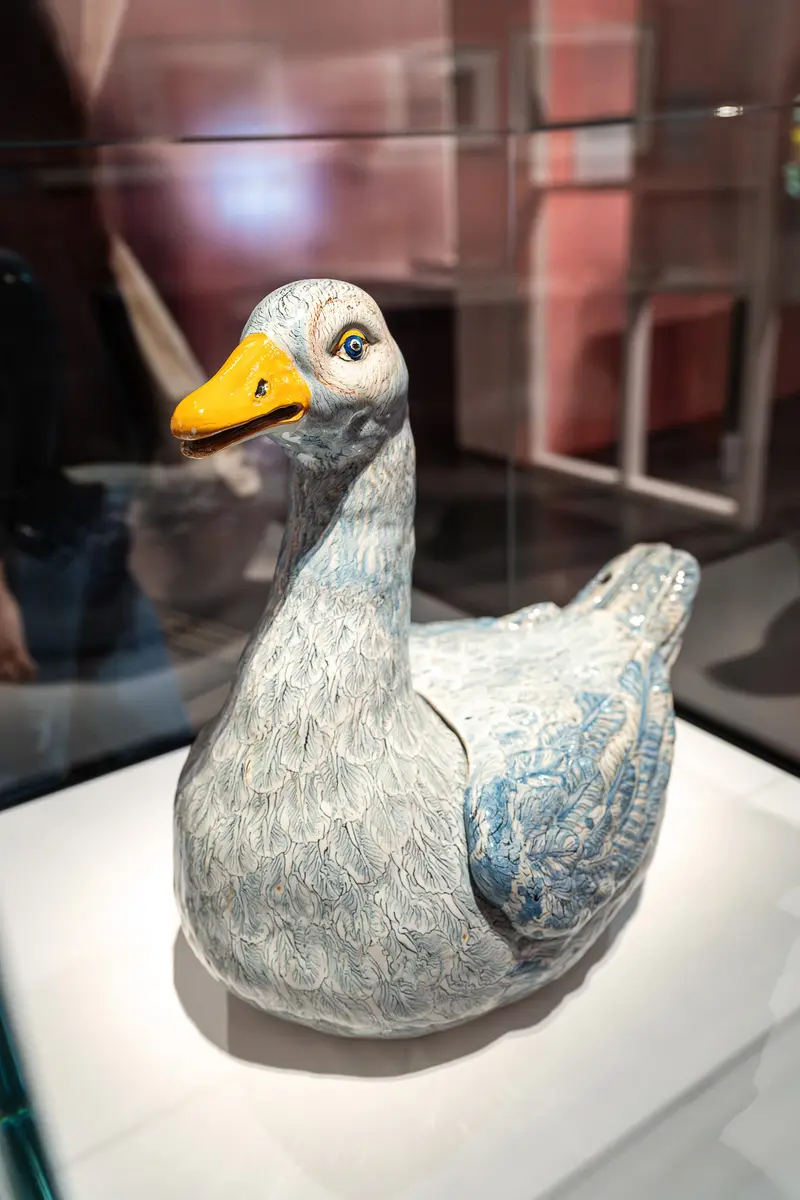 Ceramic Blue-Gray Duck Sculpture in Museum Display Case