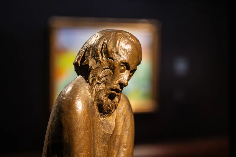 Bronze Sculpture of Contemplative Elderly Figure at Gothic Modern Exhibition