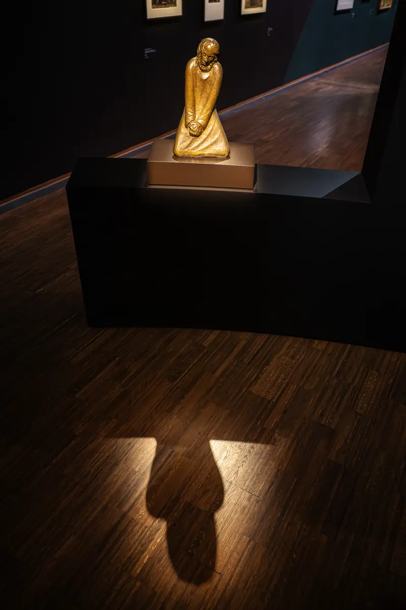 Golden Statue Casting Shadow at Gothic Modern Exhibition, Albertina Museum