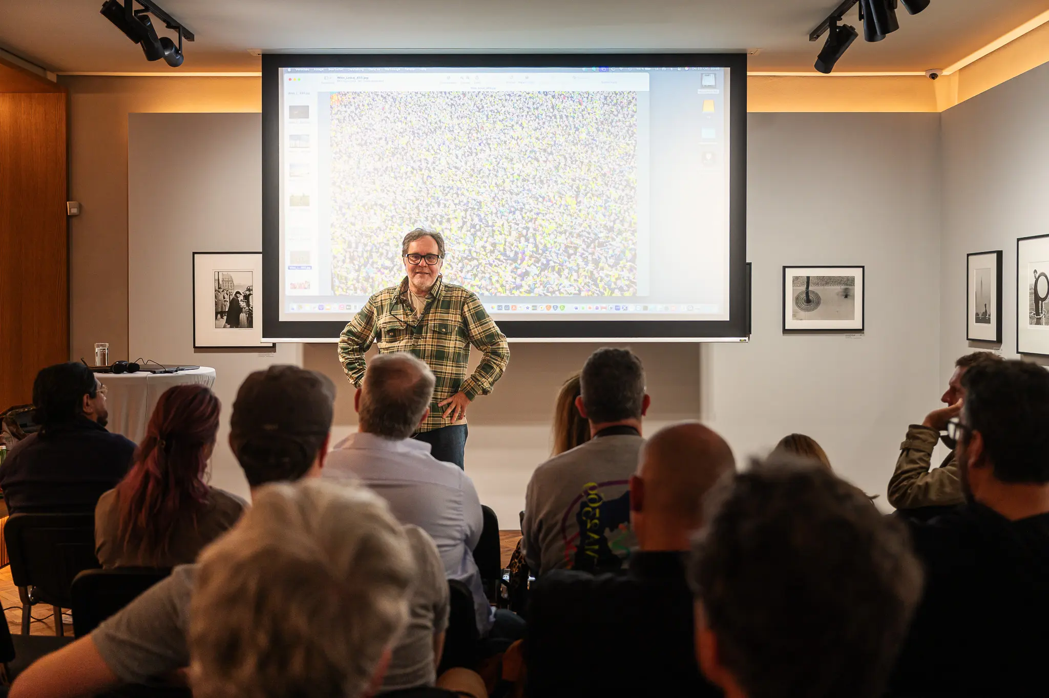 Hans-Jürgen Burkard at Leica Gallery Vienna. Hans-Jürgen Burkard Presenting to Audience at Leica Gallery Vienna, October 2025