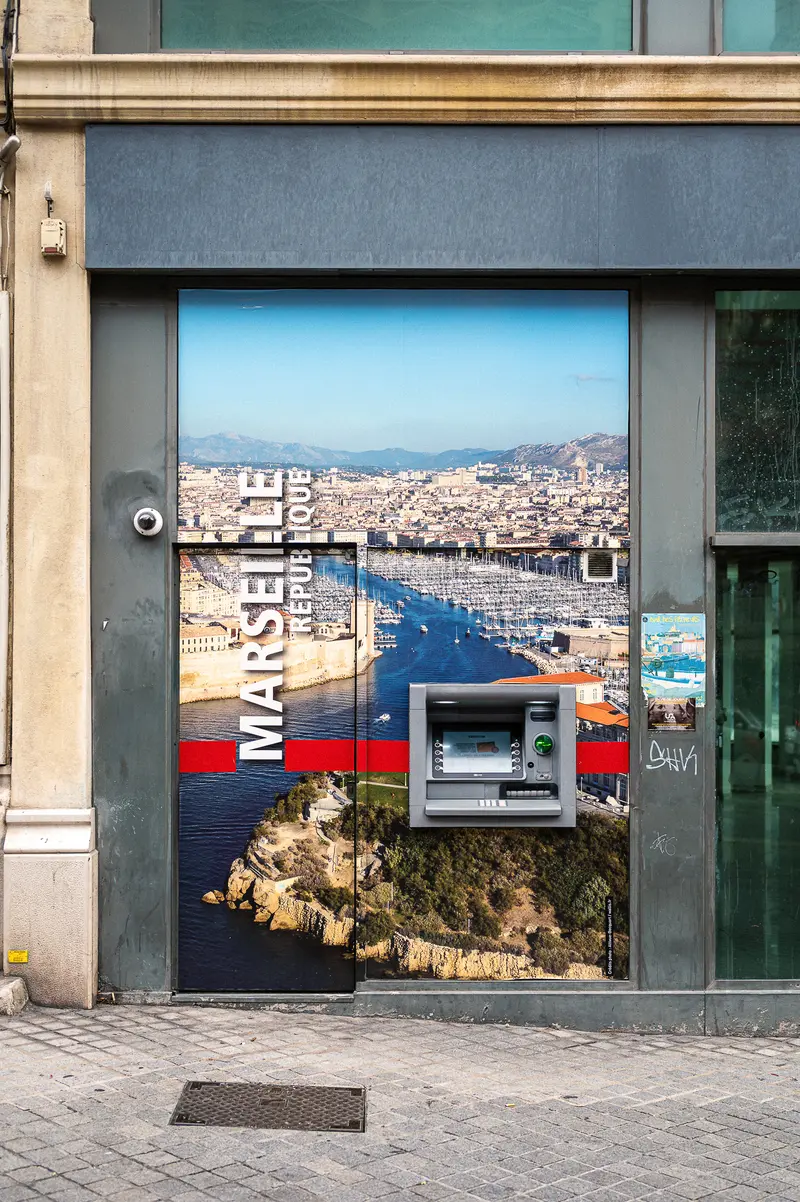 ATM at Marseille Harbor: Urban Landscape Merged with Digital Infrastructure