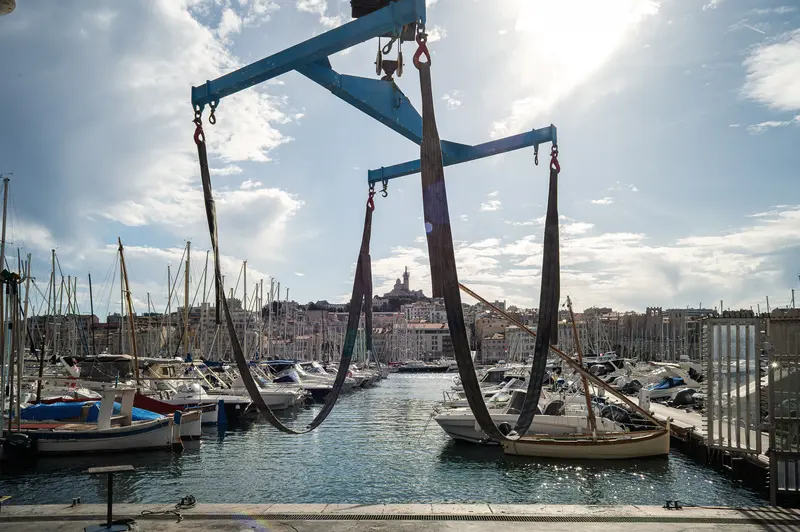 Marseille Old Port Marina with Historic Boat Hoist and Cityscape
