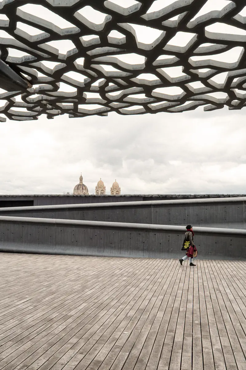Architectural Geometry: Marseille Museum Terrace with Intricate Overhead Canopy