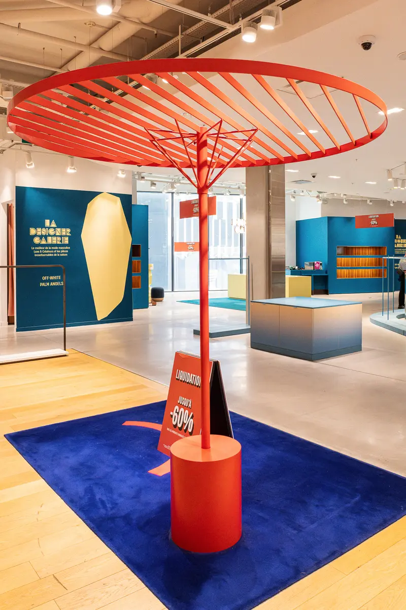 Red Umbrella Display in Modern Museum Exhibition Space