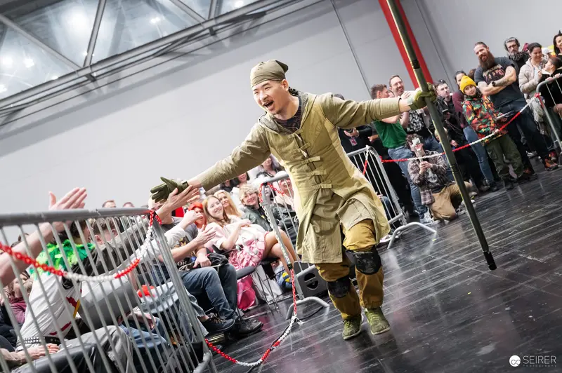 Performer in Military Costume Engages Crowd at Vienna ComicCon 2025