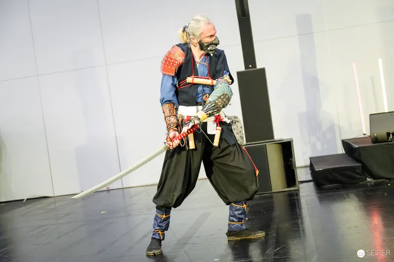 Stage Combat Performer in Traditional Costume at Vienna ComicCon 2025