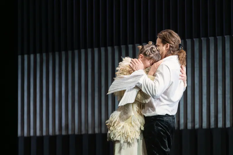 Hamlet and Ghost Embrace in Dramatic Theatrical Performance