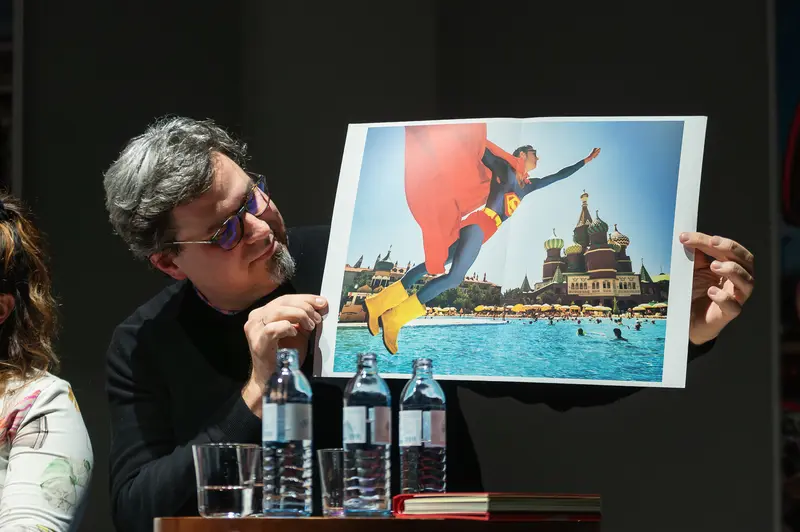 Reiner Riedler Displays Photograph at Westlicht Panel Discussion, Budapest