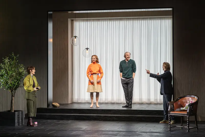 Four Performers in Minimalist Interior at Theater in der Josefstadt, Vienna